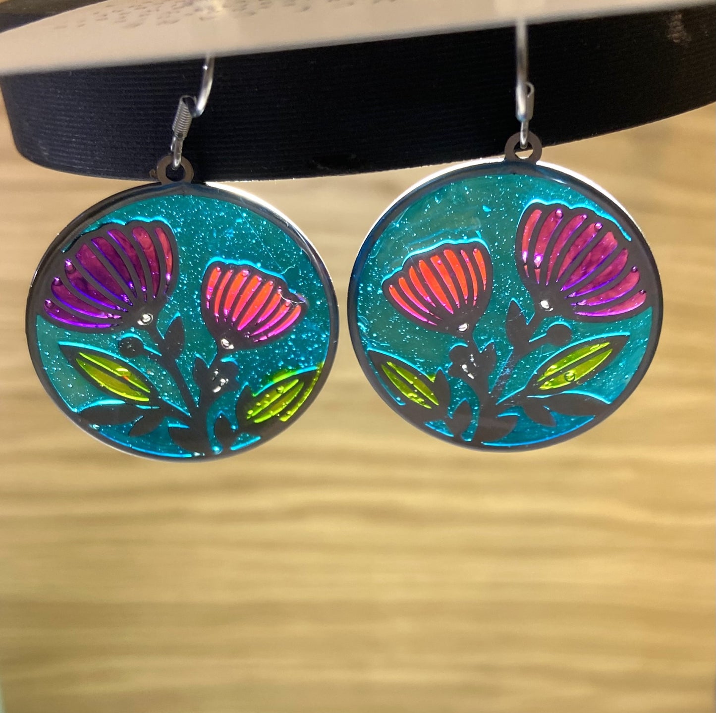 Pink & purple resin flower with blue background