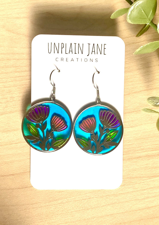 Pink & purple resin flower with blue background