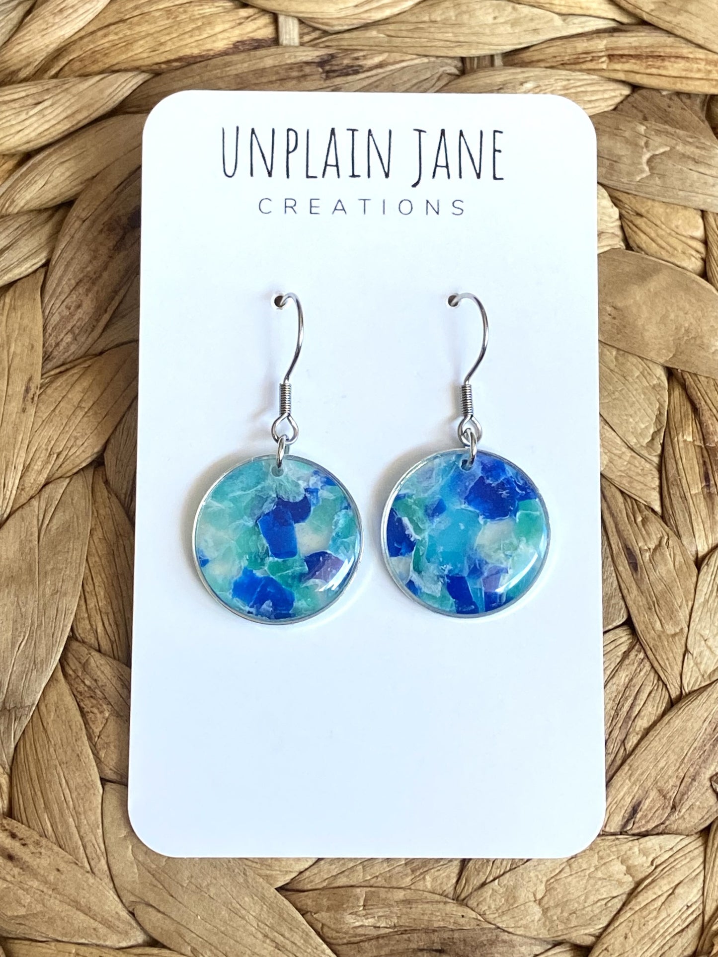 Polymer clay blue translucent round silver edging earring