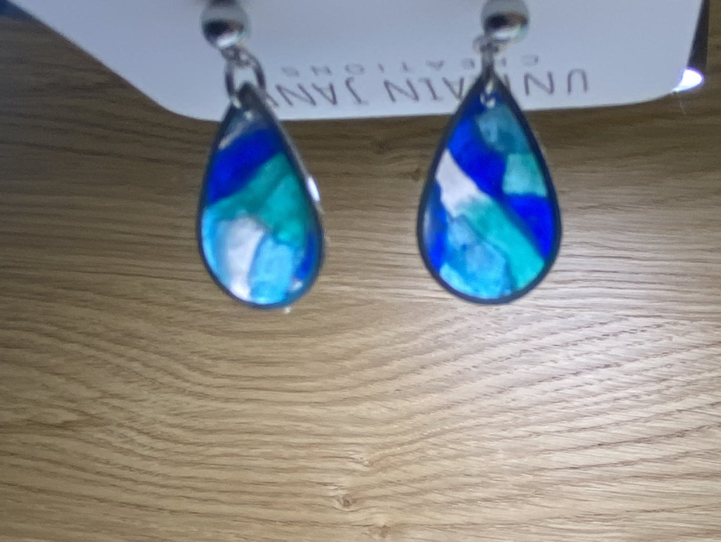 Polymer clay blue translucent small tear drop silver edging