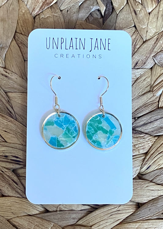 Polymer clay aqua translucent circle gold edging