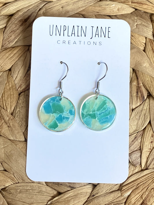 Polymer clay aqua translucent circle silver edging