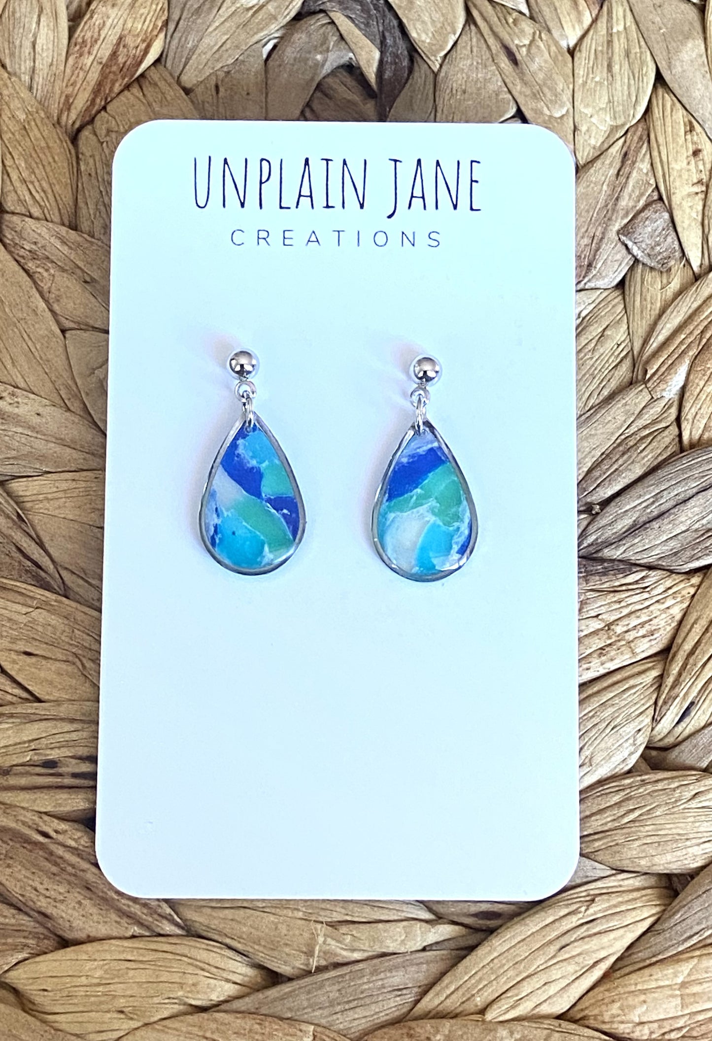 Polymer clay blue translucent small tear drop silver edging